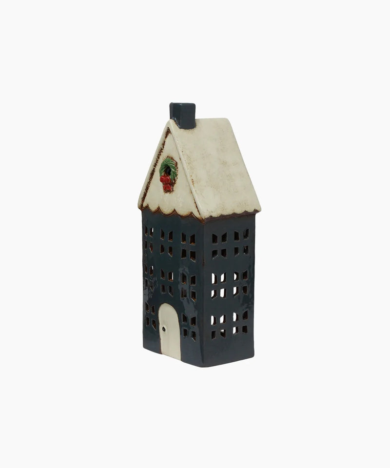 Large blue ceramic Christmas tealight house with festive wreath