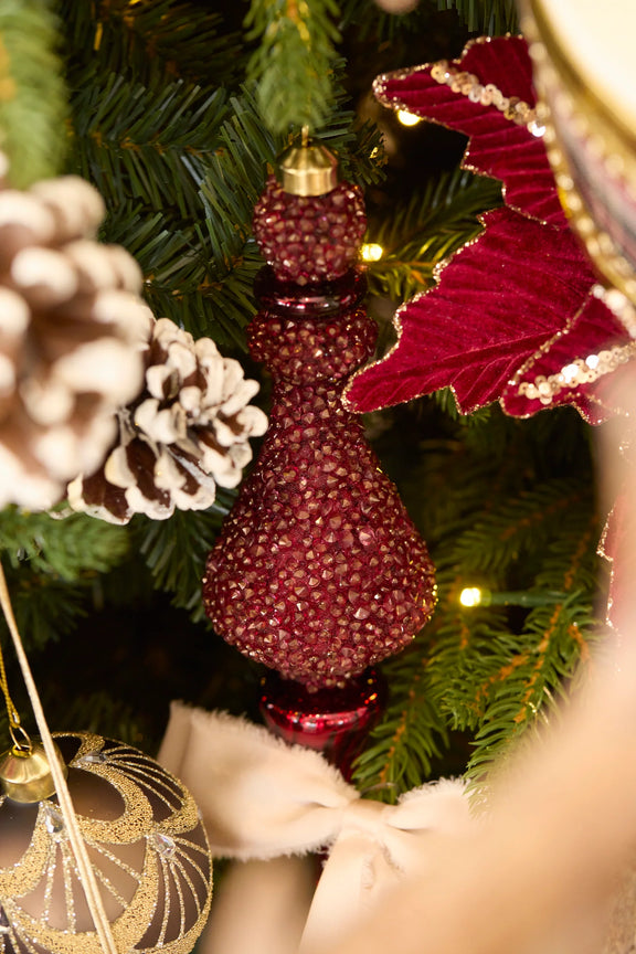 Exquisite beaded burgundy glass Christmas finial – elegant hanging ornament hanging on a christmas tree.