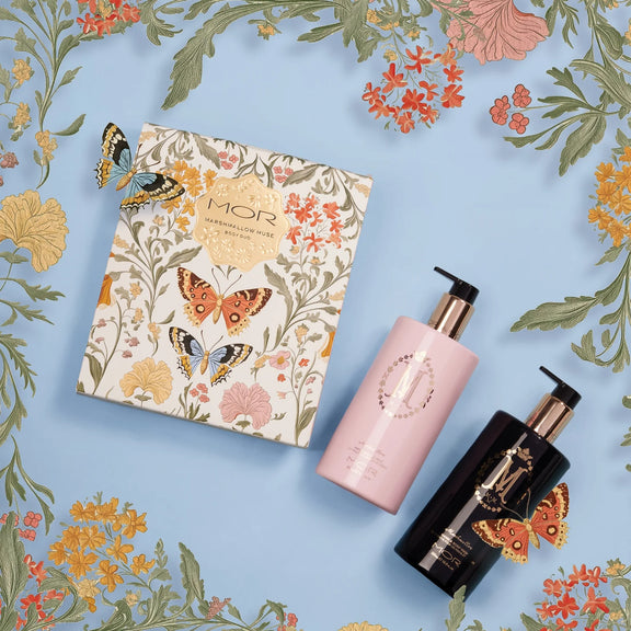 Marshmallow perfume duo styled with gift packaging