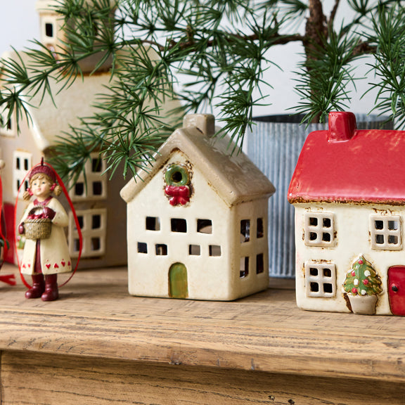 Festive ceramic villa glowing with candle – Alsace tea light house
