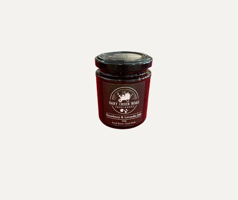 Jar of strawberry and lavender jam with a visible brand logo on a white background