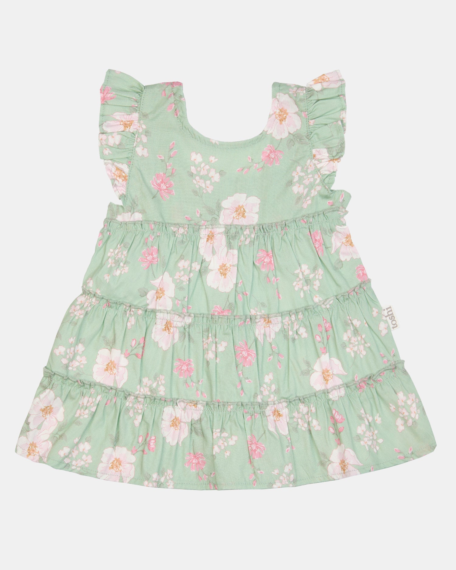Toshi Baby Dress Matilda Desert Rose Apple flat-lay showing floral tiers and frill detail.