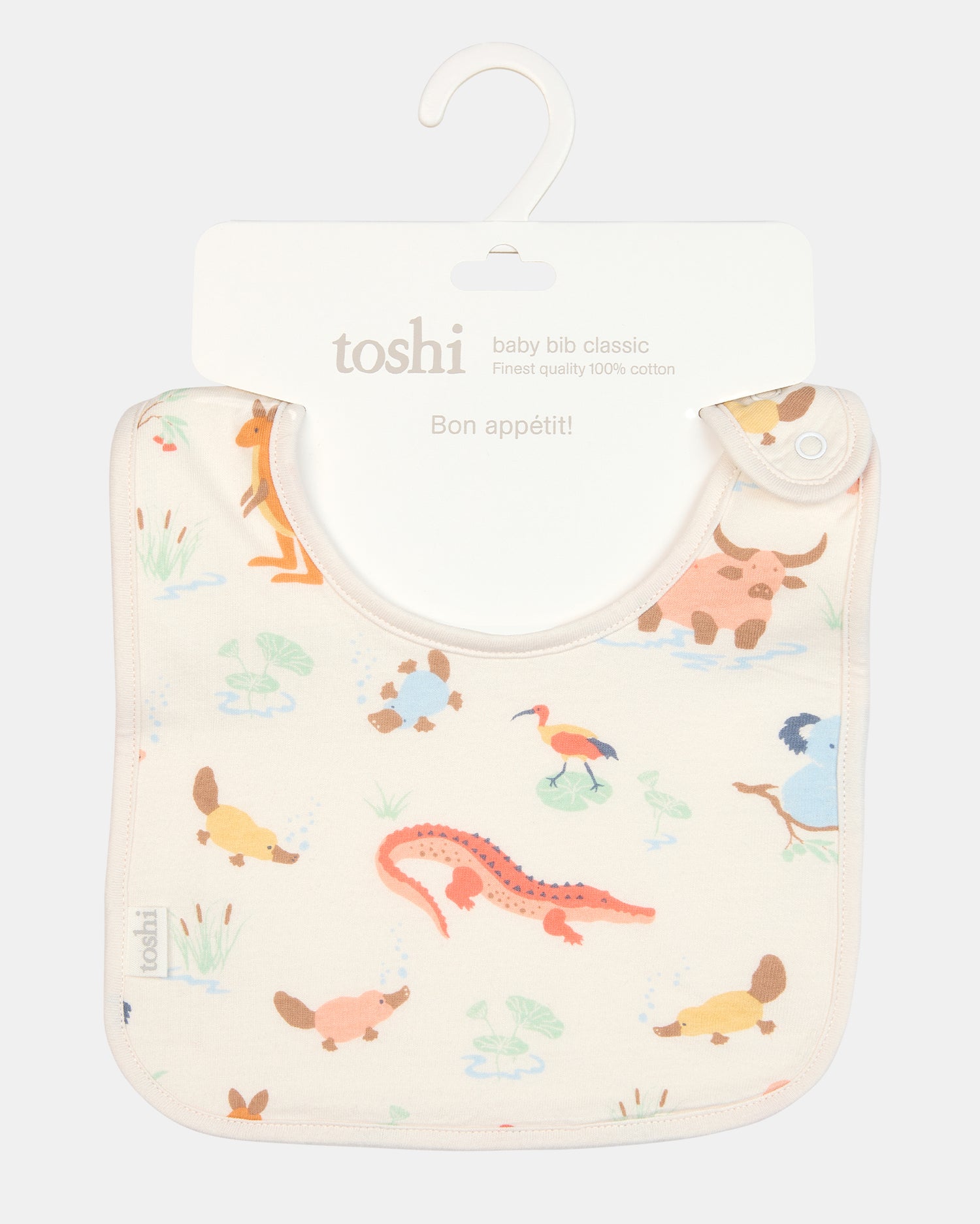 Close-up of the Toshi Kakadu Dawn bib showing exclusive pattern and