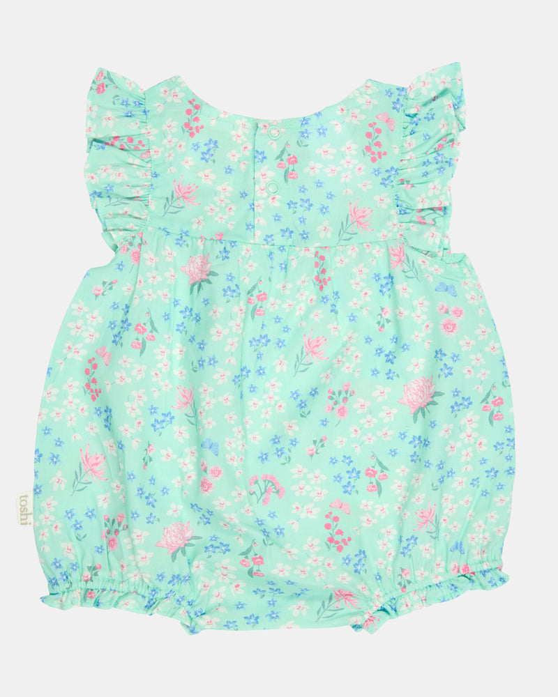 Soft cotton romper for baby girls in mint green shade - view from behind