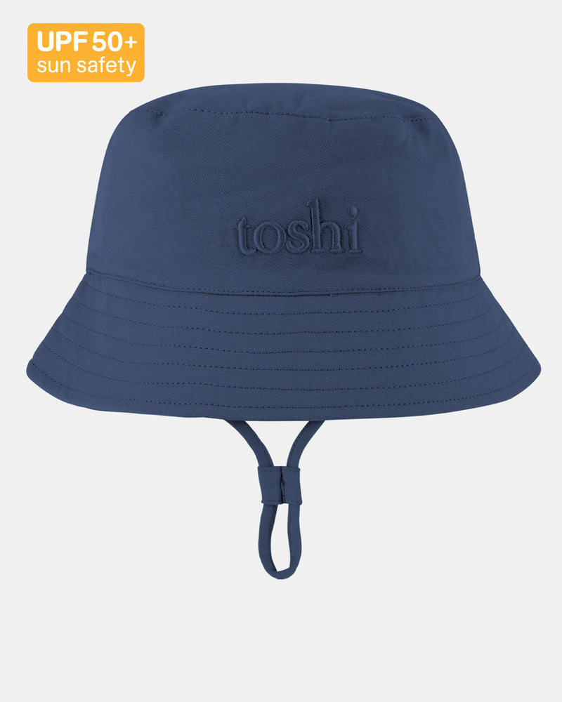 image of child outdoors wearing Toshi Billy Midnight sunhat.