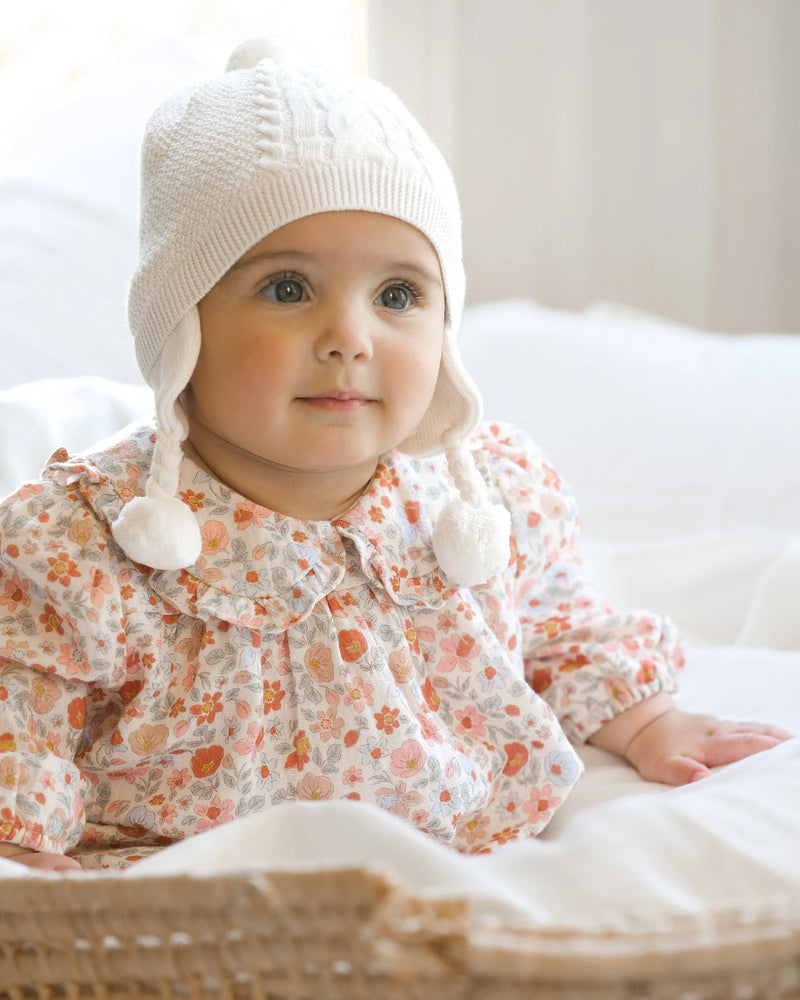 Baby wearing a Toshi baby blouse Peter Pan Rosie Posie pink floral