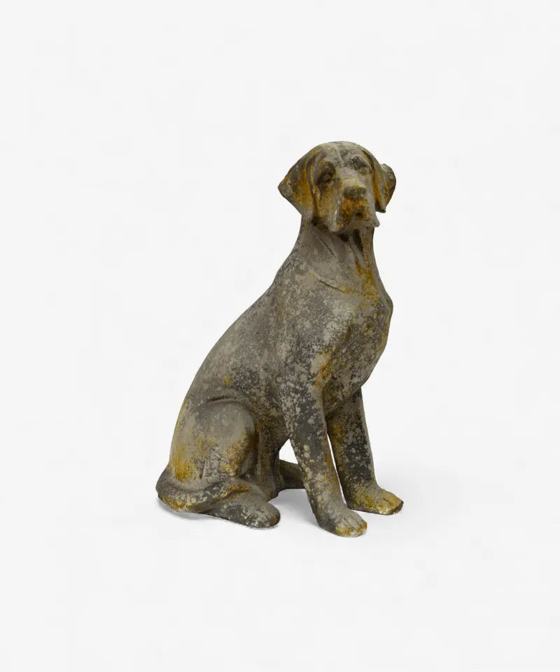 Statue of a sitting dog on a white background