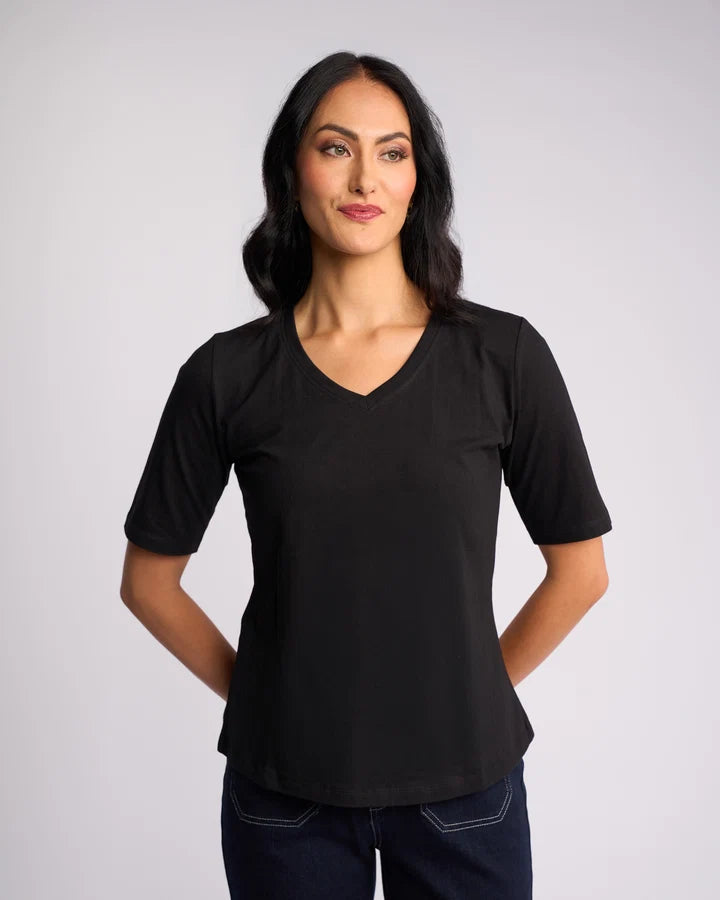 Vassalli Base Tee Black styled as a classic wardrobe staple.