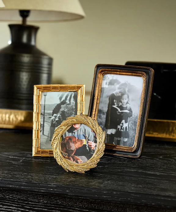 Decorative black and gold beaded picture frame for 5x7 photograph