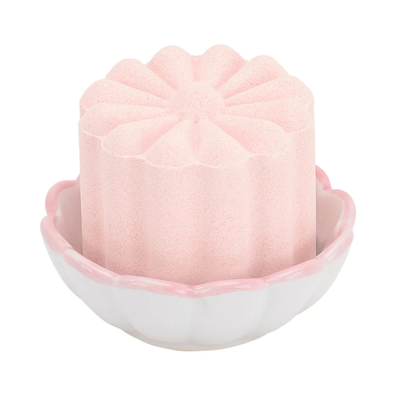 pink shower steamer in small pink and white scollop dish