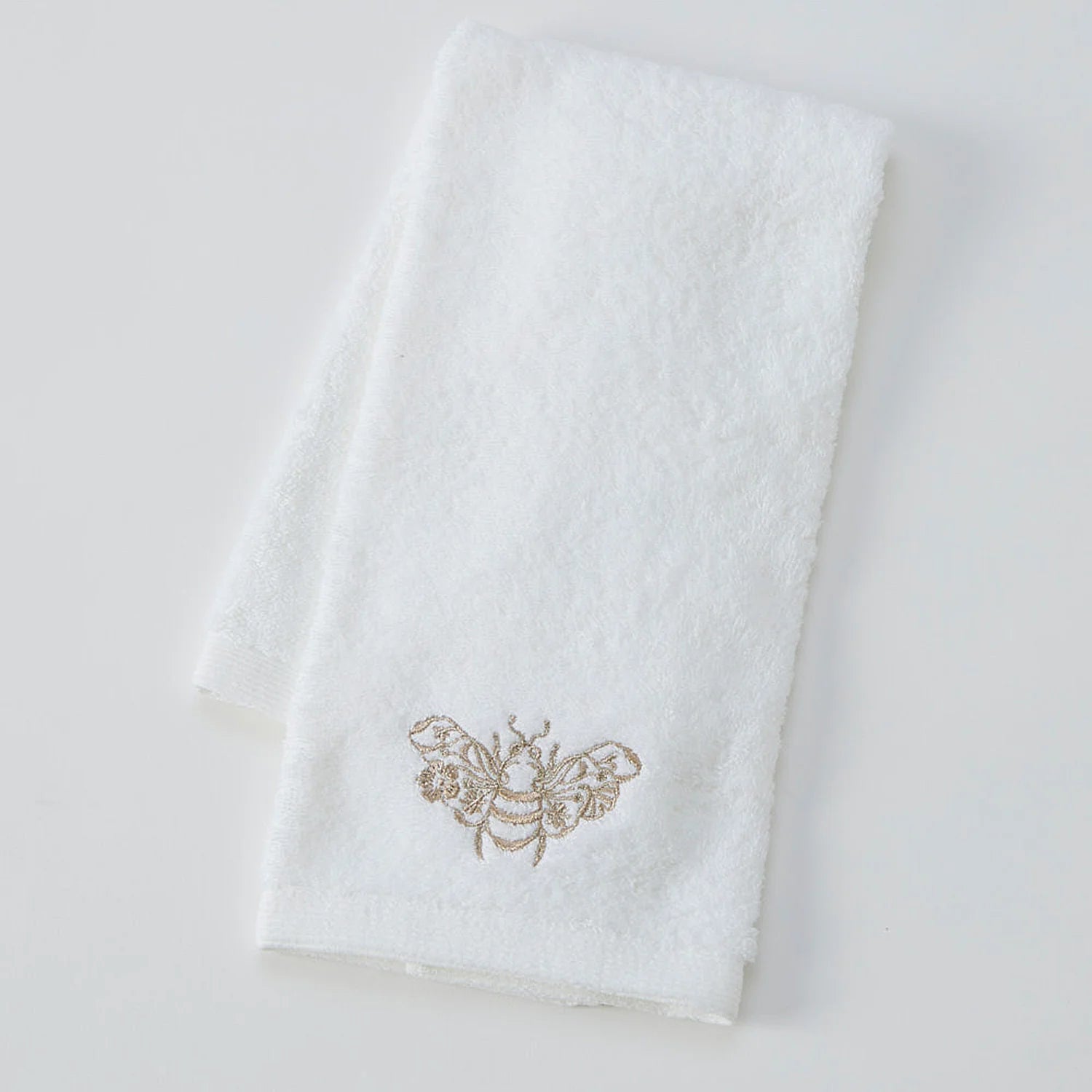 Elegant cotton towel adding a touch of luxury to bathroom décor.