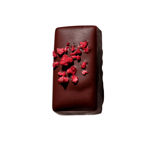 Vegan dark chocolate with sour cherry ganache and freeze-dried raspberry by Loco Love.
