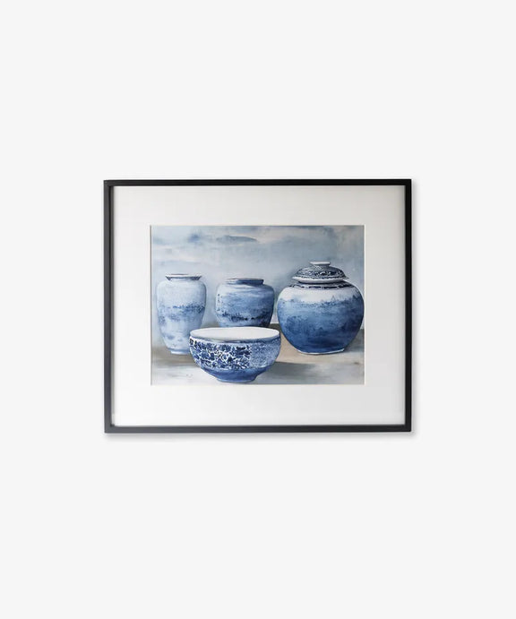 Framed artwork of blue ceramic jars and bowls on a light background