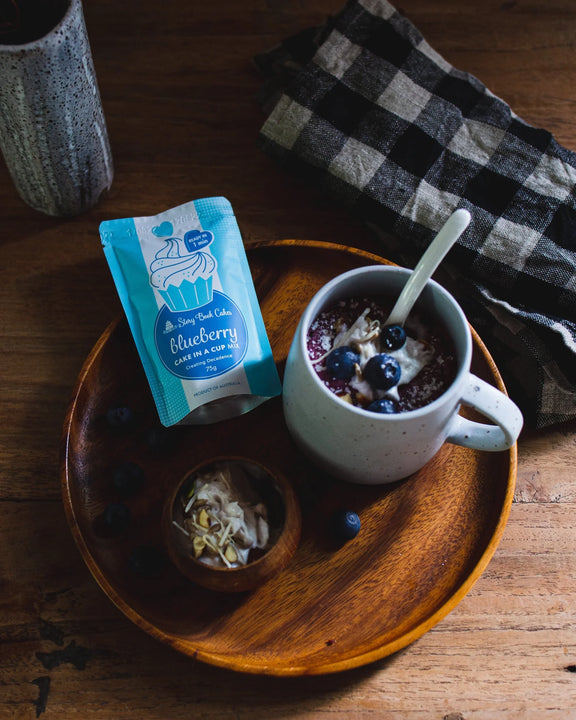 Blueberry Cake in a Cup 75 g in packaging by Story Book Cakes