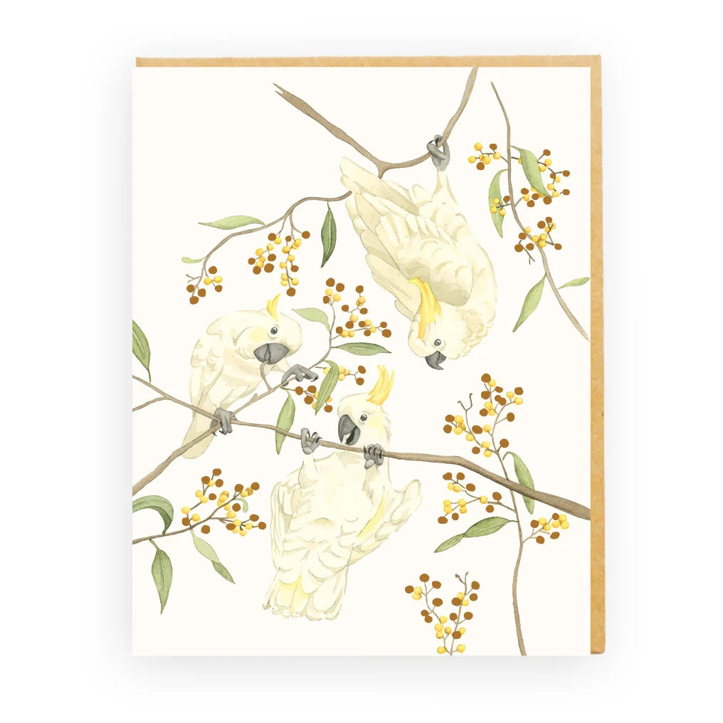 Branching Out gold foil greeting card featuring three illustrated cockatoos on branches