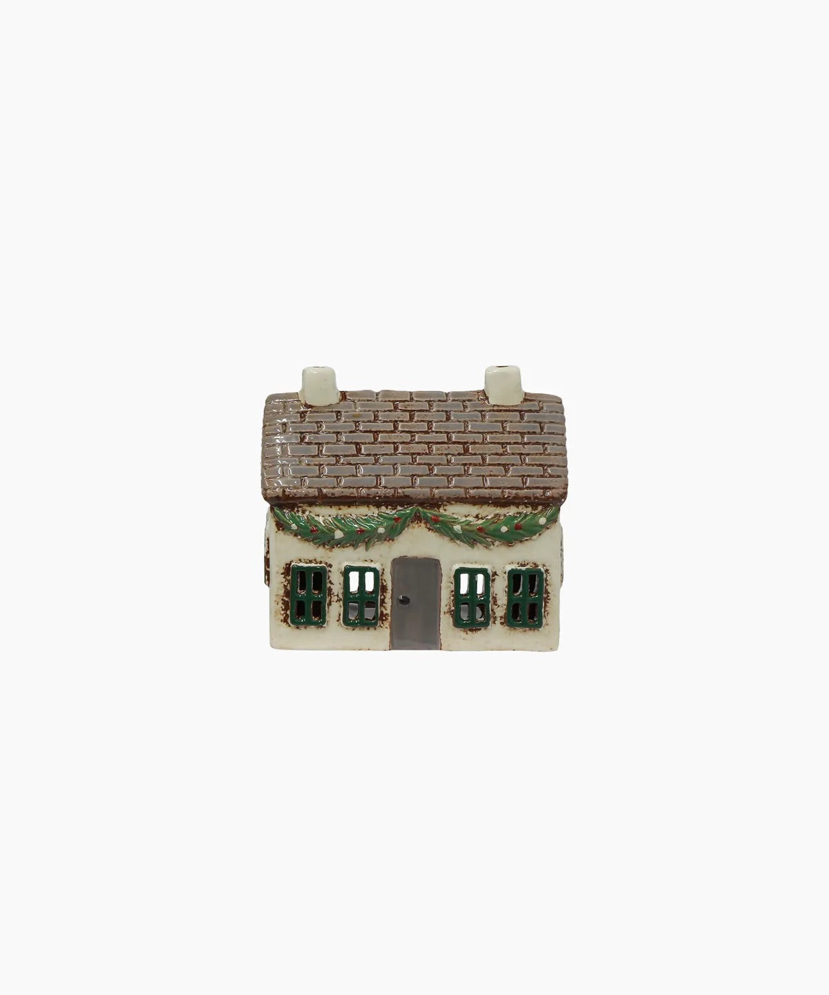 Festive ceramic cottage with decoration