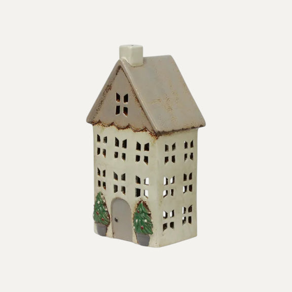 Ceramic Christmas tea light house in stone with decorative trees in pots