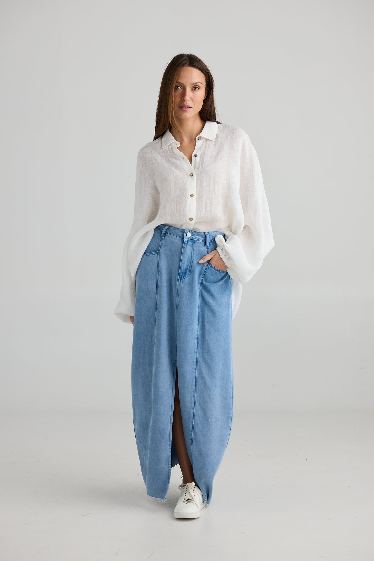 Cruise Skirt Blue Wash front view with raw hem