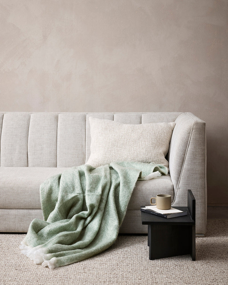 modern living room with Oatmeal neutral decorative cushion with viscose lustre