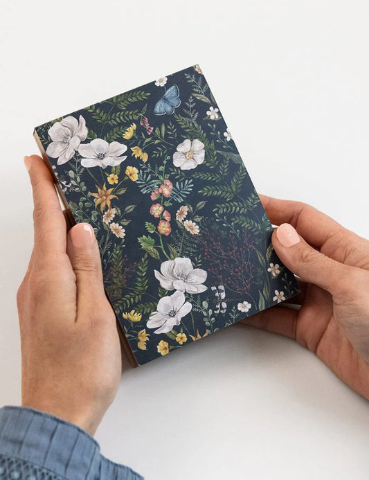 A6 floral notepad illustrated by Vicky Lastra with 100 blank tear-off pages.