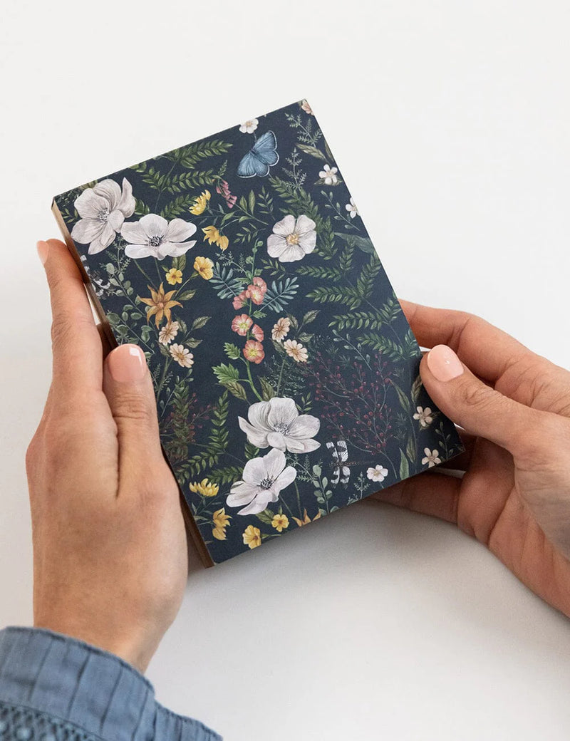 A6 floral notepad illustrated by Vicky Lastra with 100 blank tear-off pages.