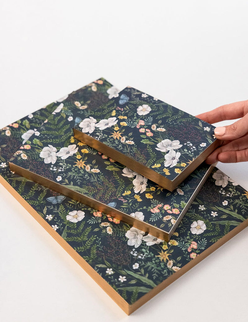 Compact floral notepad with heavyweight blank pages for notes, lists and ideas.
