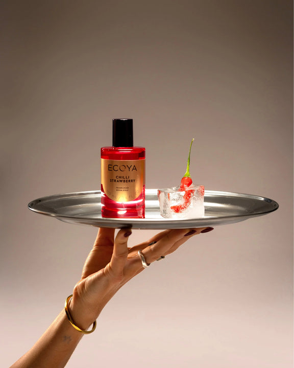 Limited-edition Ecoya Chilli Strawberry Room Spray styled with festive décor