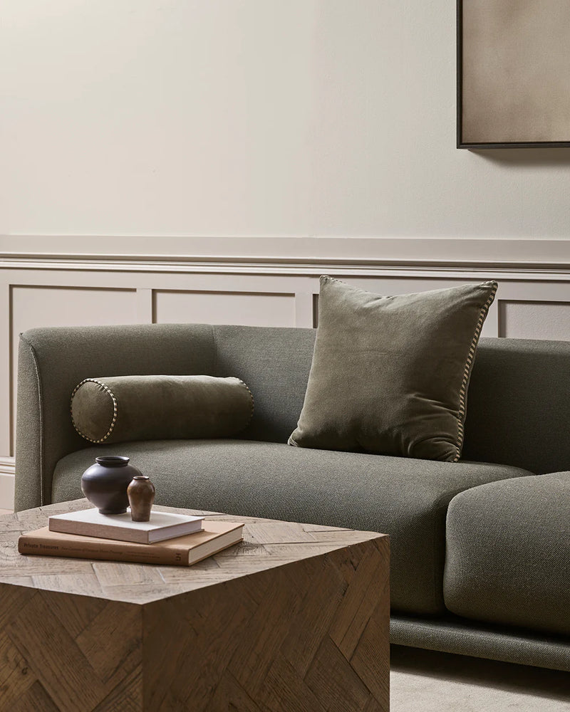 Dusky green cotton velvet cushion with striped linen gusset