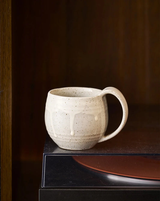 Gloss White Embrace stoneware coffee mug with rounded design.
