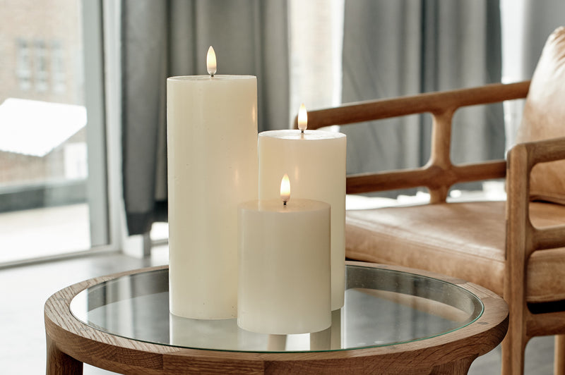 Classic ivory flameless wide pillar candle styling