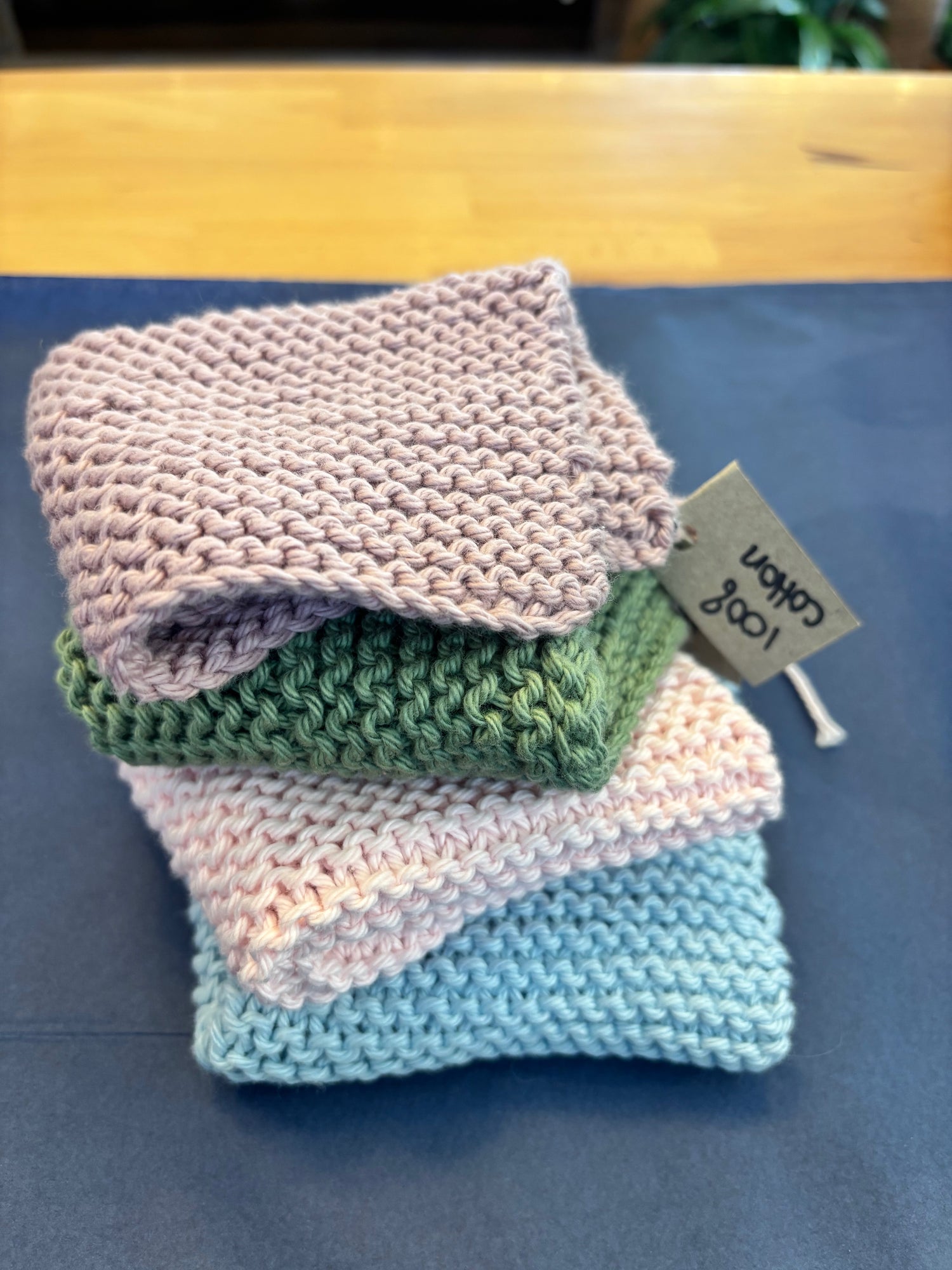 Locally made Baby Blue face washer by Room In The Shed in a pile of assorted colours