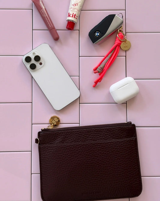 Wine Elms+King slim zip pouch with front slip pocket.