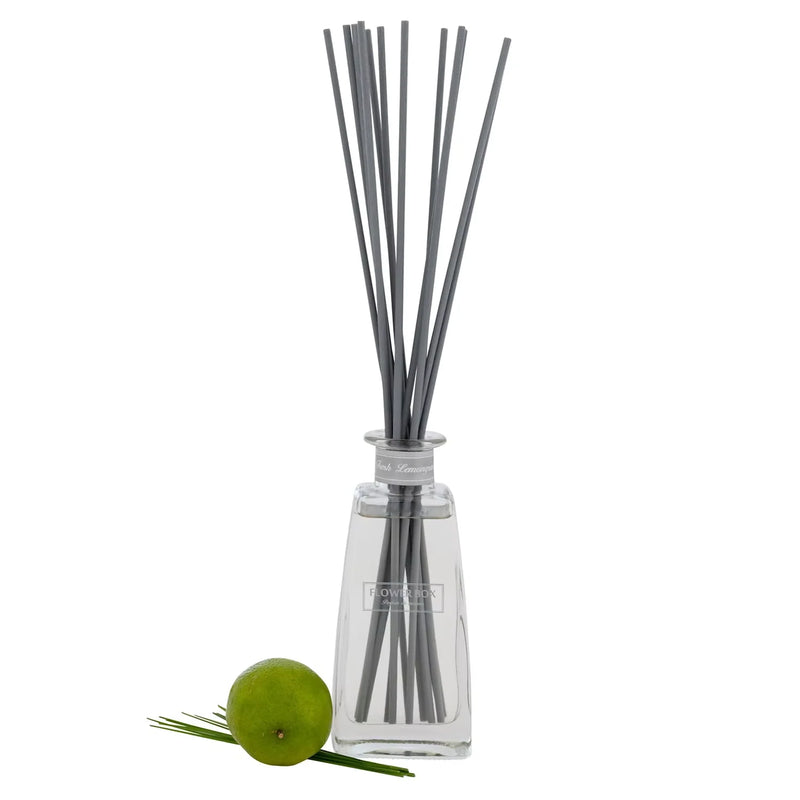 Clear diffuser bottle with gray sticks and green apple on a white. Fresh Lemongrass - Standard Diffuser Flower Box 