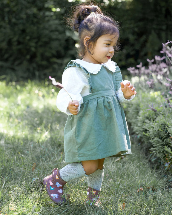 toddler girl wearing baby waterproof booties fleece lined gumboots