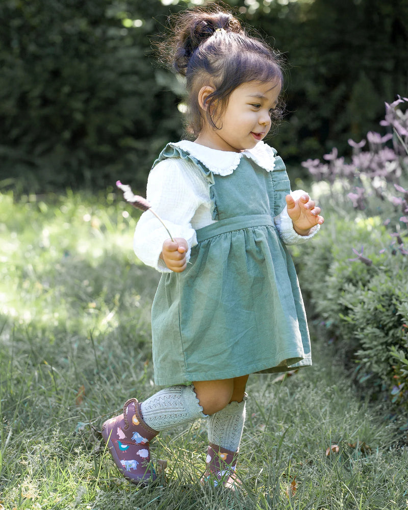 toddler girl wearing baby waterproof booties fleece lined gumboots