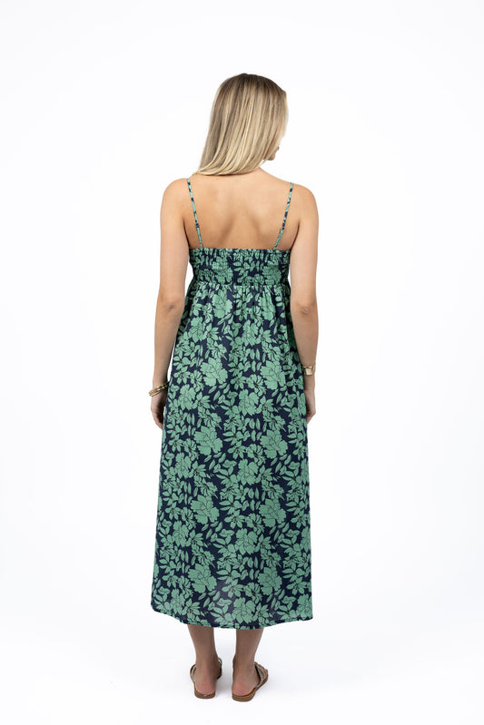 Back view of Fleur Sway Dress showing shirred detail and flowing skirt.

Cotton voile floral maxi dress with adjustable straps, perfect for summer.