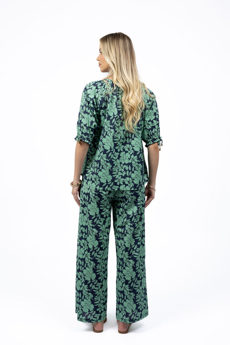 Back view of relaxed floral pants by Humidity Lifestyle, 100% cotton voile.