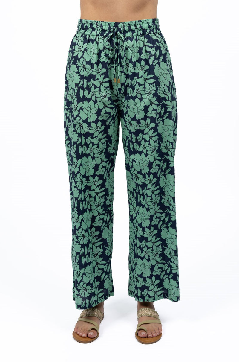 Mid-high-waisted cotton pants in exclusive Fleur print, front view.