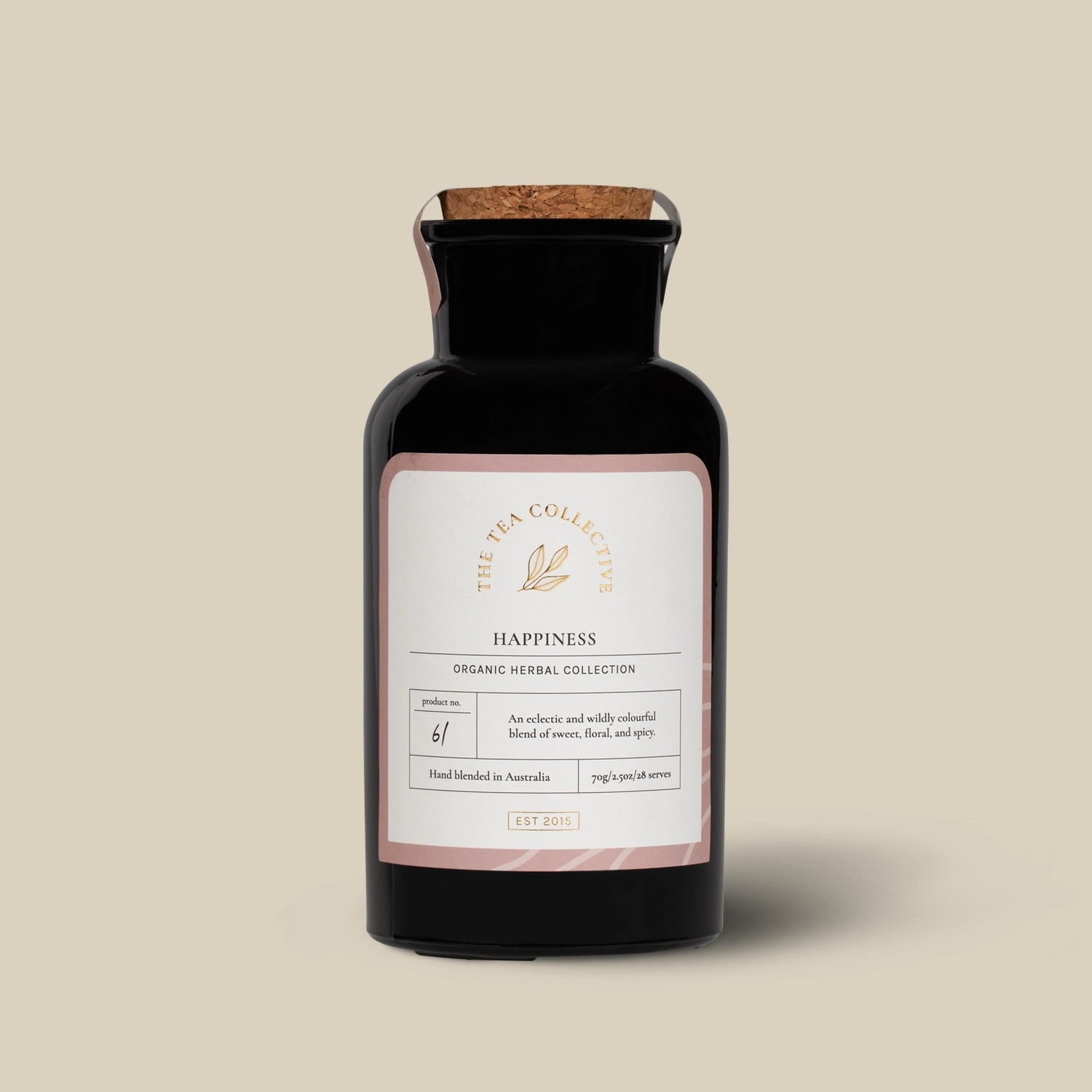 Happiness Organic Herbal Tea by The Tea Collective in an apothecary-style glass jar.