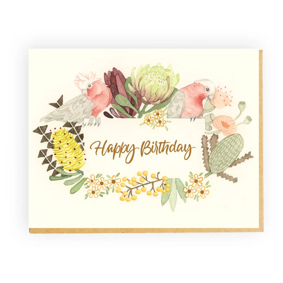 Australian birthday card featuring two galahs and colourful native flowers