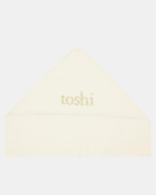 Cream hooded baby bath towel by Toshi