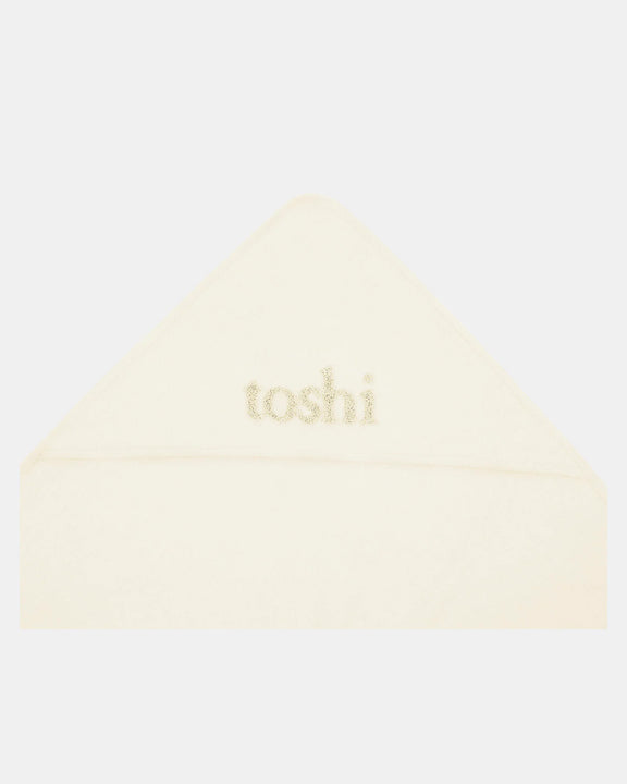 Cream hooded baby bath towel by Toshi