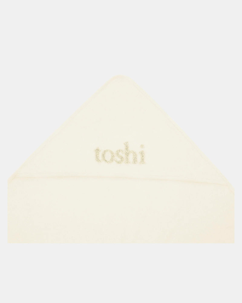Cream hooded baby bath towel by Toshi