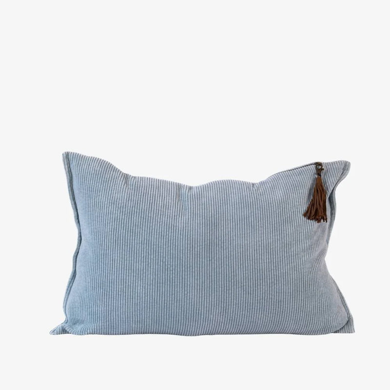 Rectangular soft blue cushion featuring textured corduroy fabric and artisan-made details.