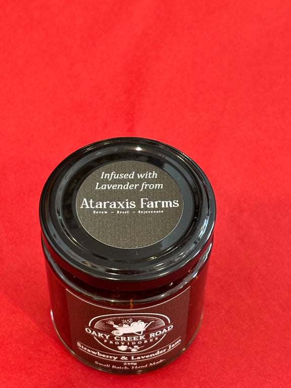 Jar of product from Oaky Creek Road on a red background