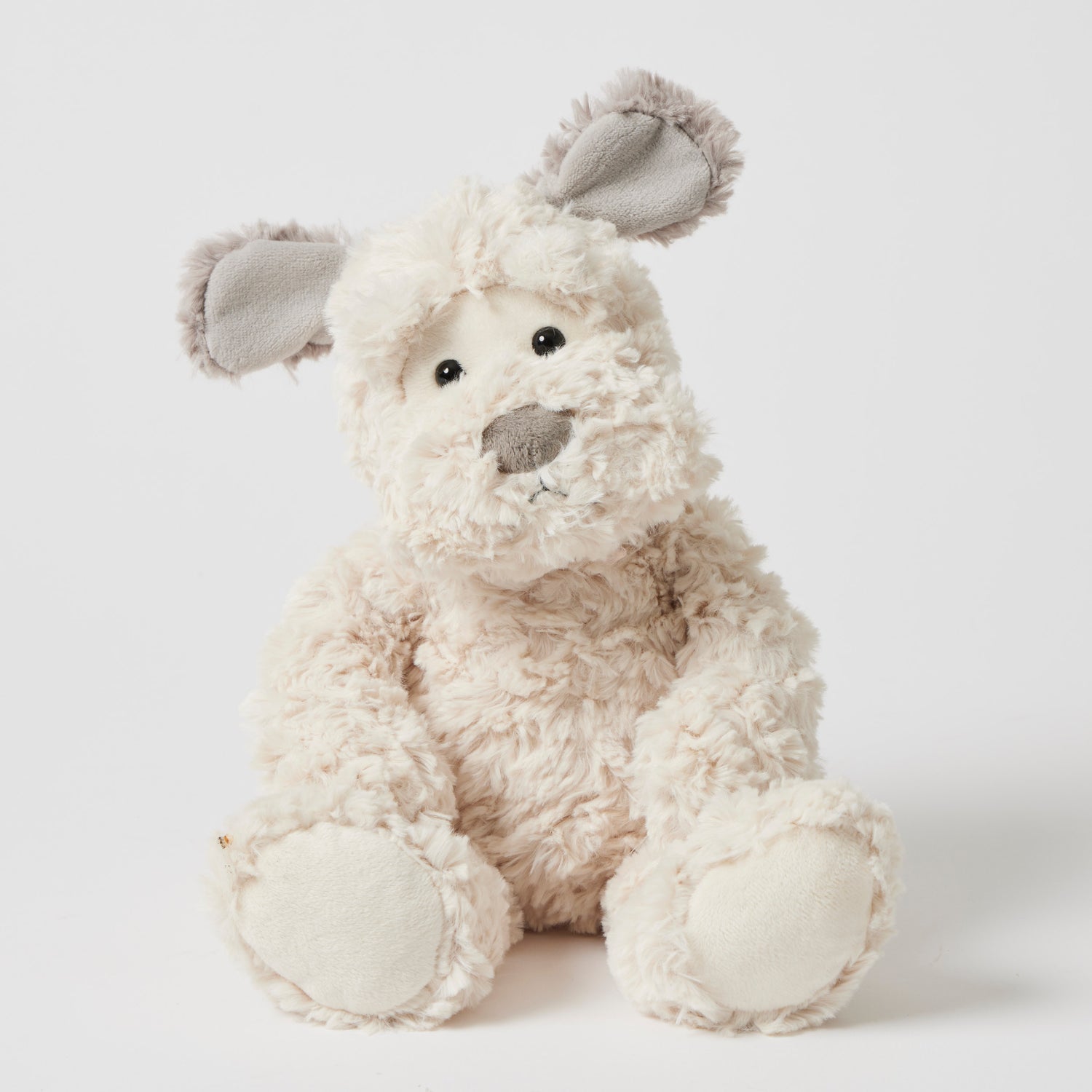 Ultra-soft Scruff the Dog plush toy with weighted beanie bottom.