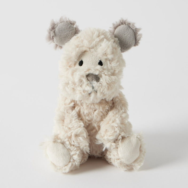 Cream baby dog rattle with soft faux fur and embroidered details 
