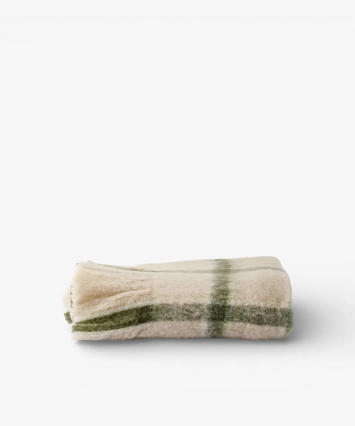 Juniper Check Throw with green check pattern on a soft neutral background.