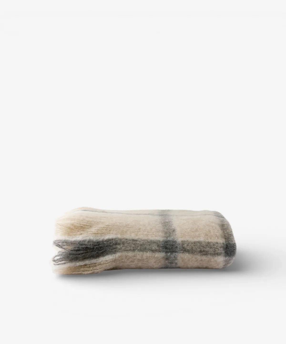 Juniper Check Throw with grey check pattern on a soft neutral background.