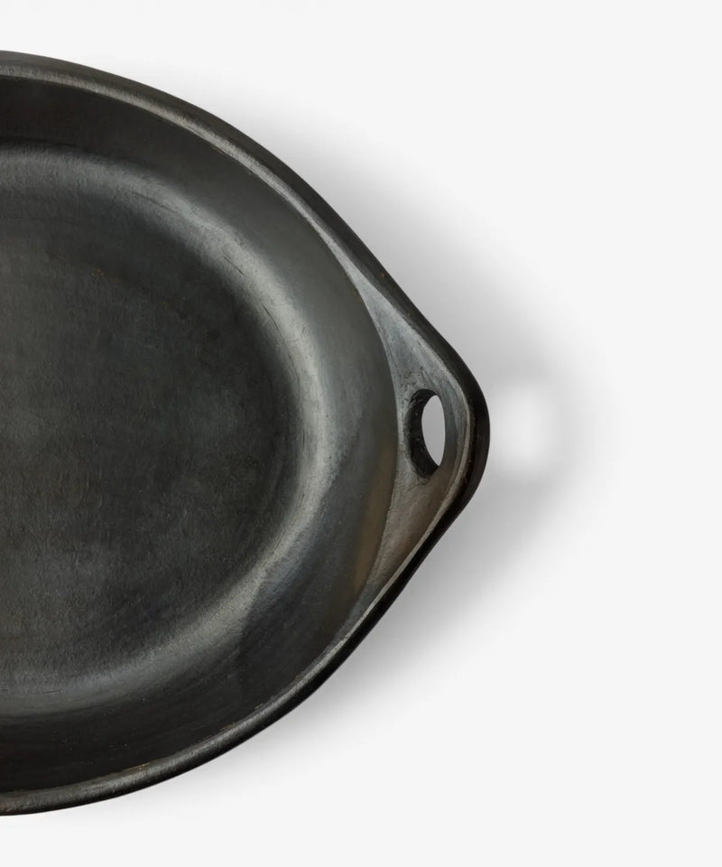 Handmade La Chamba clay baking and serving dish suitable for oven, barbecue and stovetop cooking.